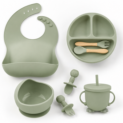 Complete silicone baby feeding set in sage green - bib, divided suction plate, bowl, sippy cup and utensils