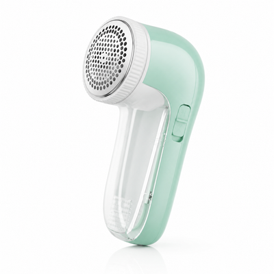 Mint green handheld electric fabric shaver with stainless mesh head