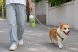 2-in-1 pet travel bottle shown in use