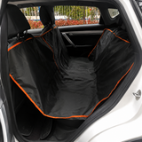 Dog car hammock installed across the back seat of an SUV showing full seat coverage