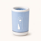 Blue silicone dog paw cleaner cup, studio shot