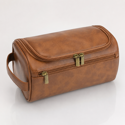 Brown PU leather hanging travel toiletry bag with antique brass zippers and a side carry handle