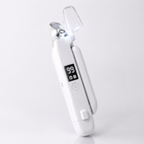 Pet nail grinder with its clear guard cover open and LED light revealing the grinding port