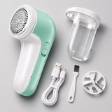 Fabric shaver kit with lint compartment, USB cable, cleaning brush and spare blade