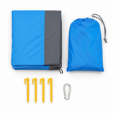 Beach blanket with its drawstring stuff pouch, four ground stakes and a carabiner clip