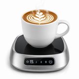 Silver smart mug warmer with a coffee mug and latte art on its black glass top