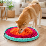 Dog foraging in the colorful snuffle mat on a living room floor