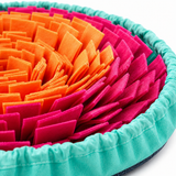 Close-up of the dense colorful fleece strips of the snuffle mat